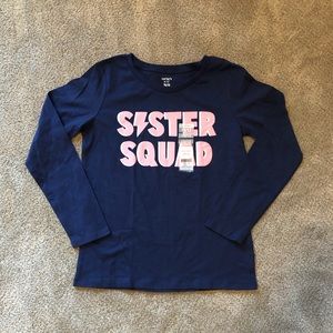 Girls navy blue sister squad shirt.